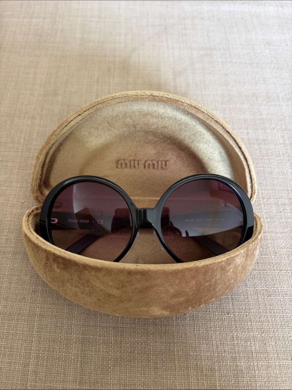Miu Miu Round Sunglasses
